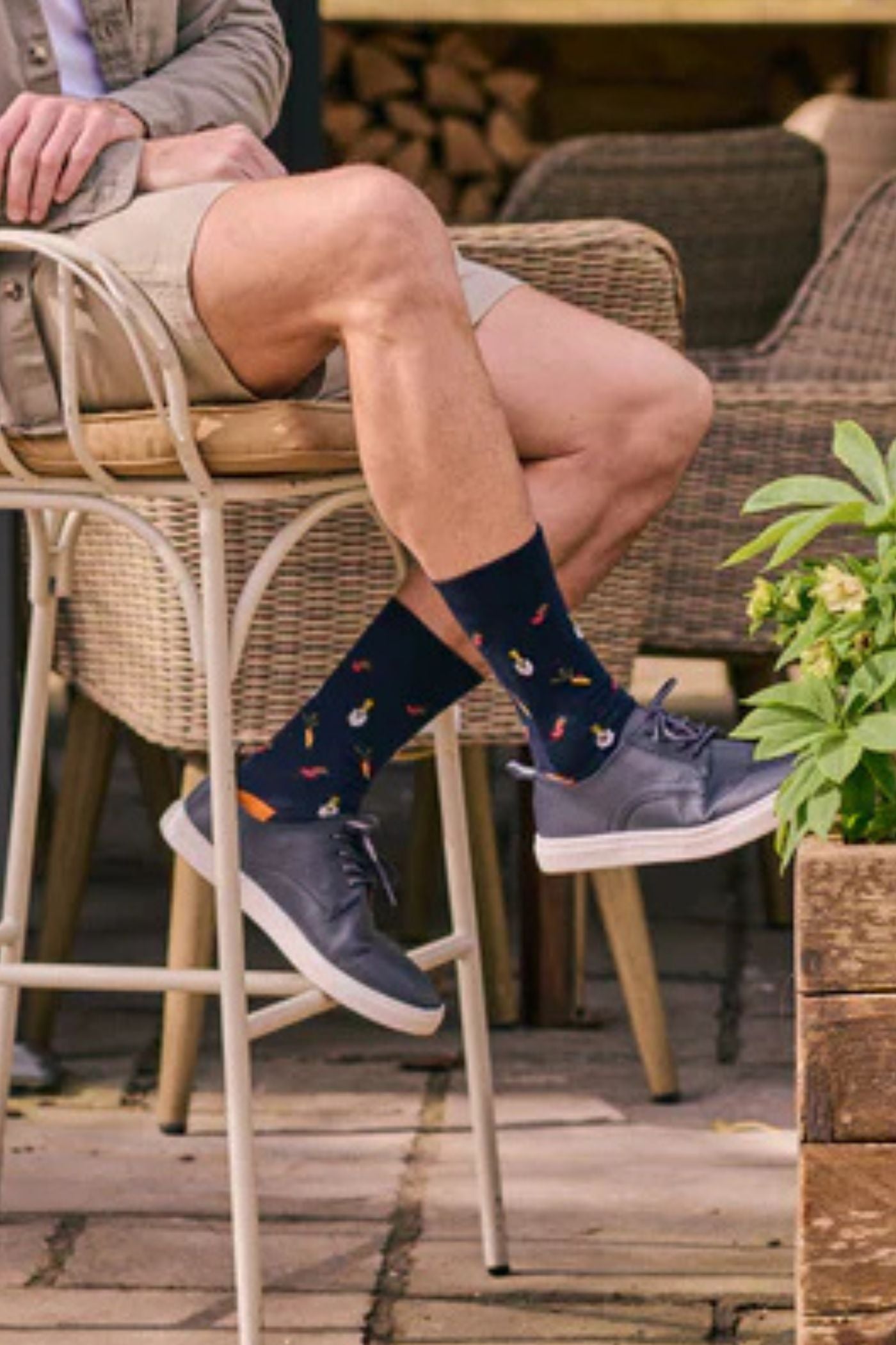 HJ Hall Men's Garden Vegetables Motif Cotton Socks - 3-Pair Pack in Navy – seated wearing socks