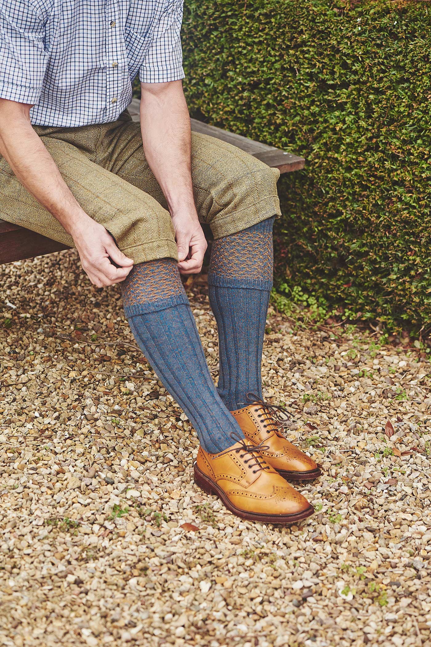 HJ Hall Honeycomb Texture Shooting Socks - Hatfield in Petrol – pulling on socks